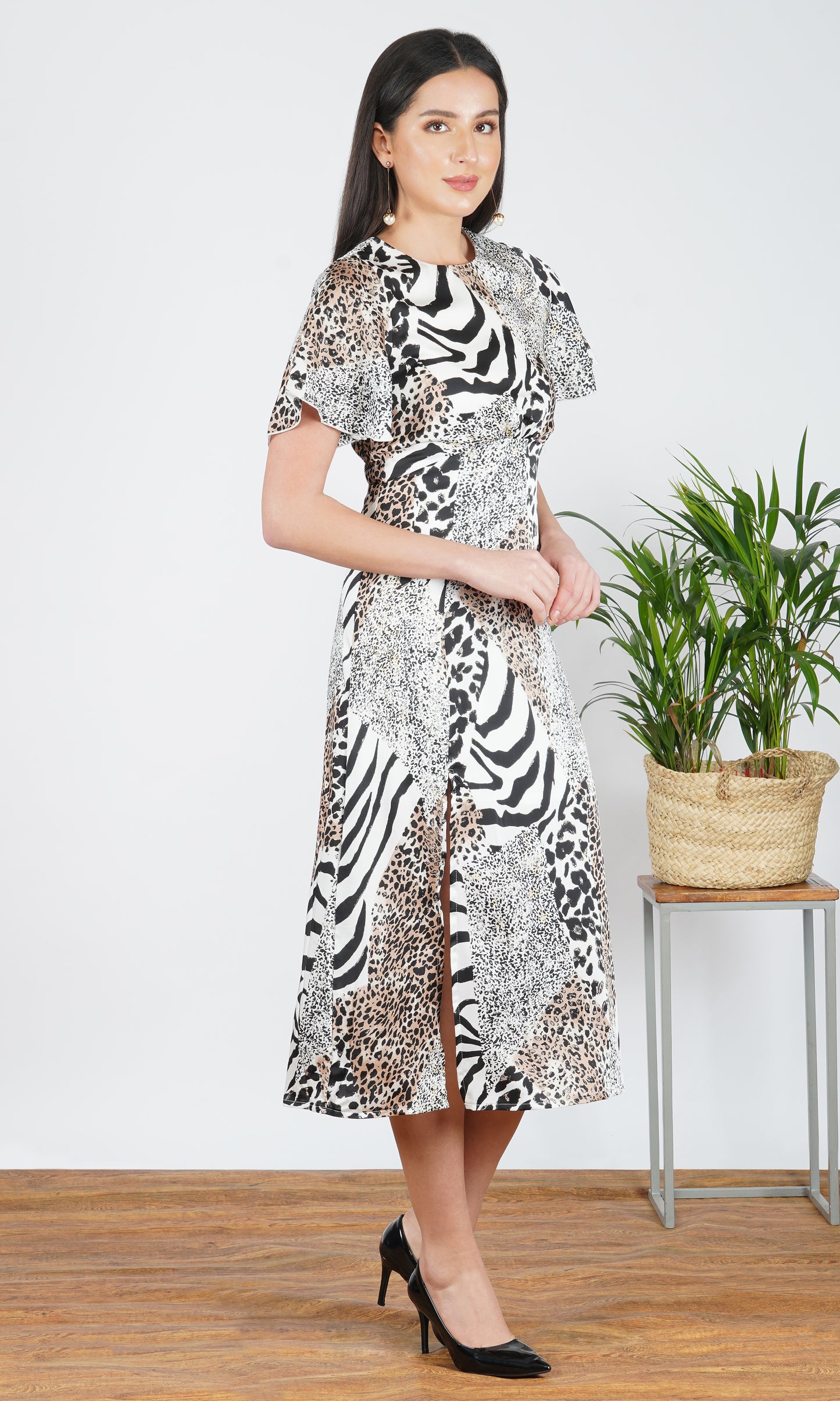 wild essence patchwork animal print midi dress