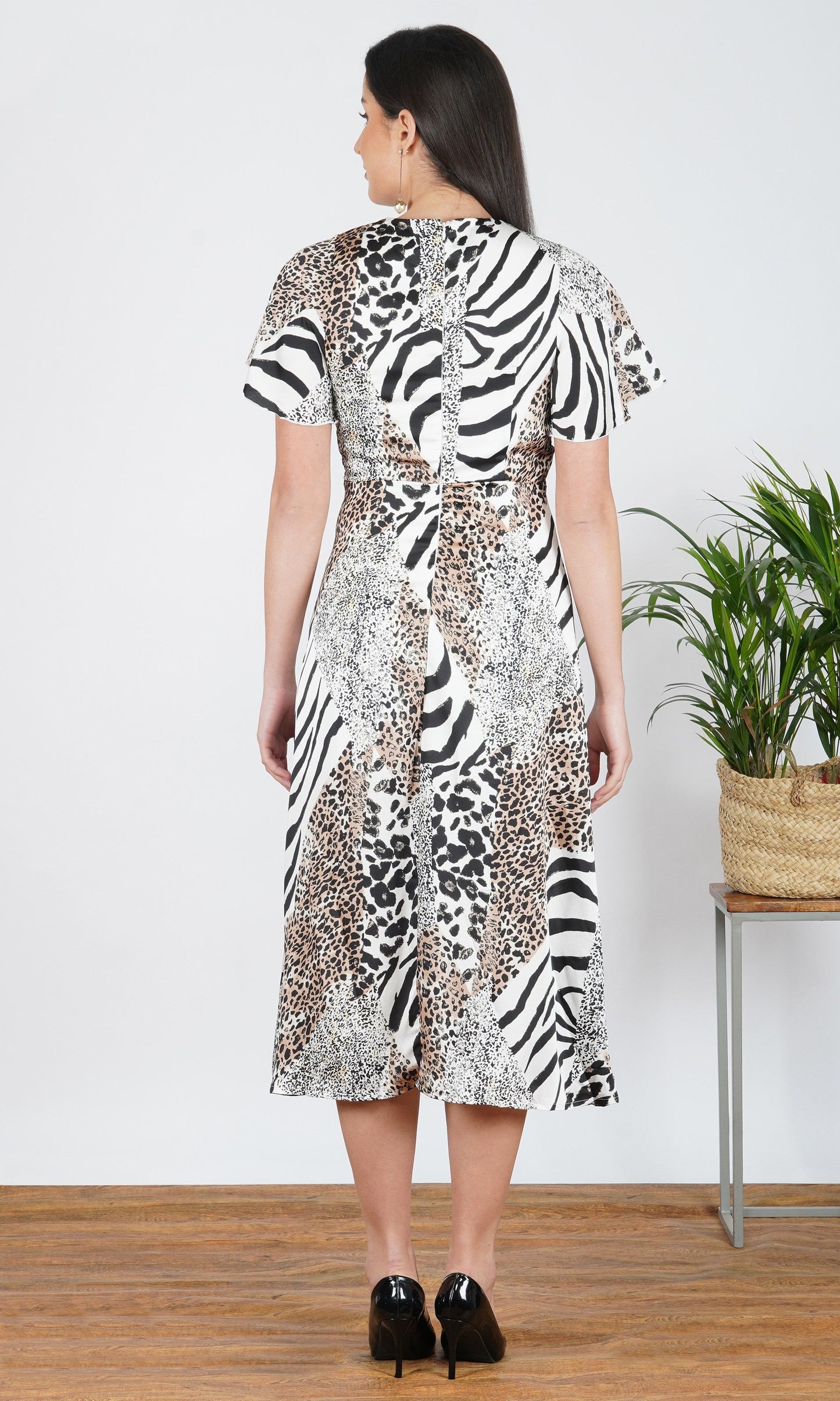wild essence patchwork animal print midi dress